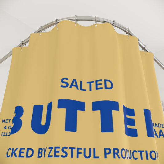 Personalized butter shower curtain with yellow butter label design and bold blue typography. Funny bathroom decor piece inspired by classic butter packaging. Unique novelty shower curtain for guest bathrooms, Airbnbs, lake cabins, and quirky home styling.