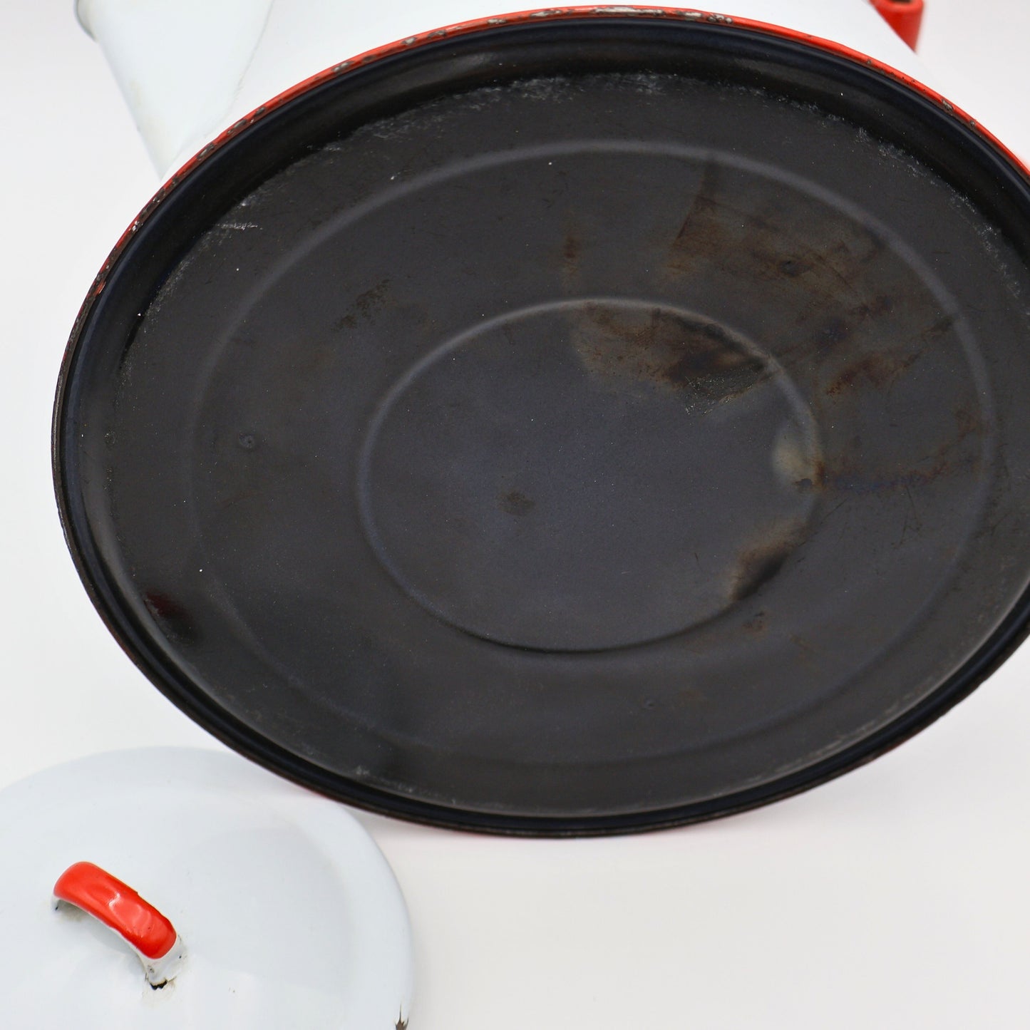 Large white and red enamel coffee kettle with lid removed, rustic western farmhouse decor