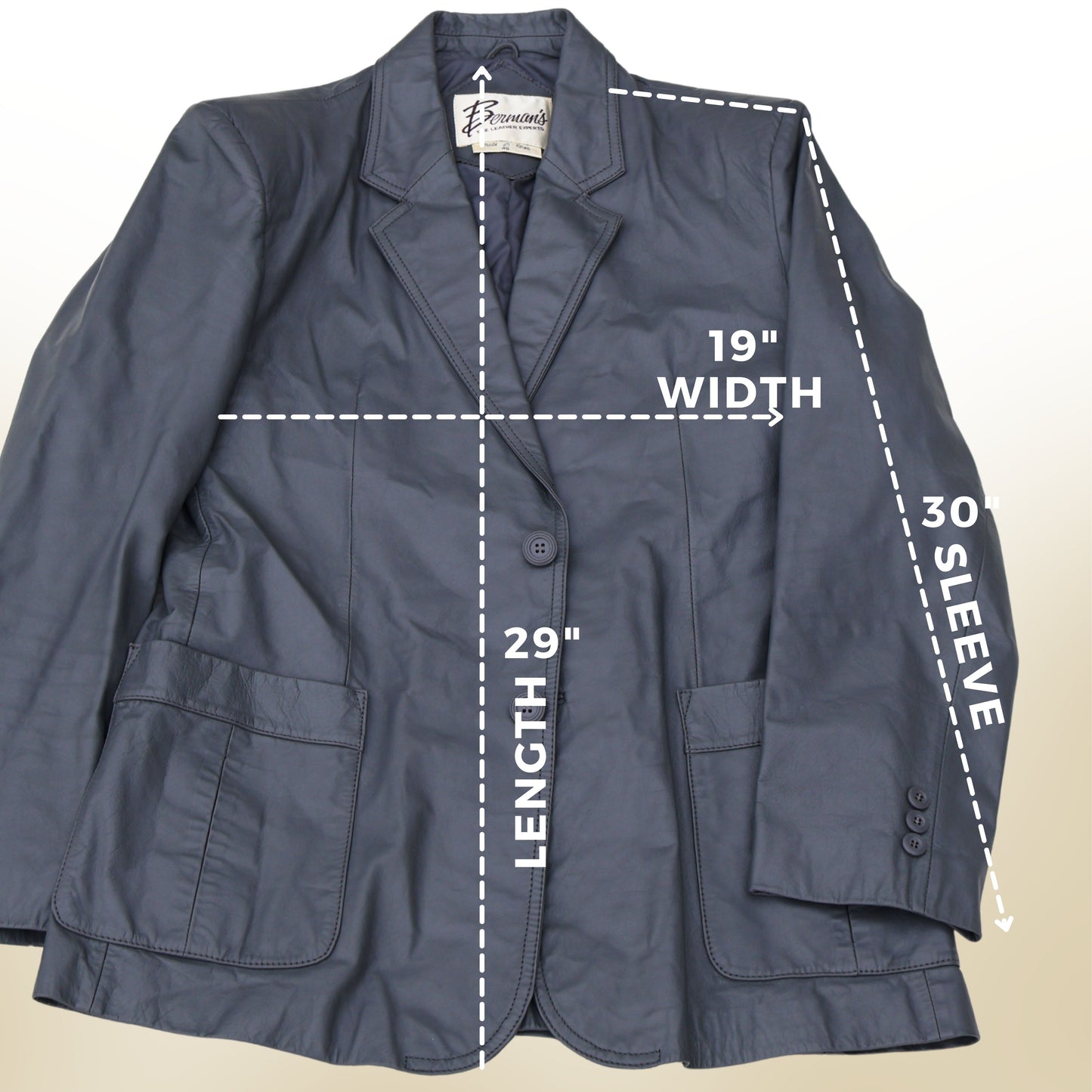 Measurement diagram of vintage gray leather blazer showing 26 inch width 30 inch length and 33 inch sleeve.