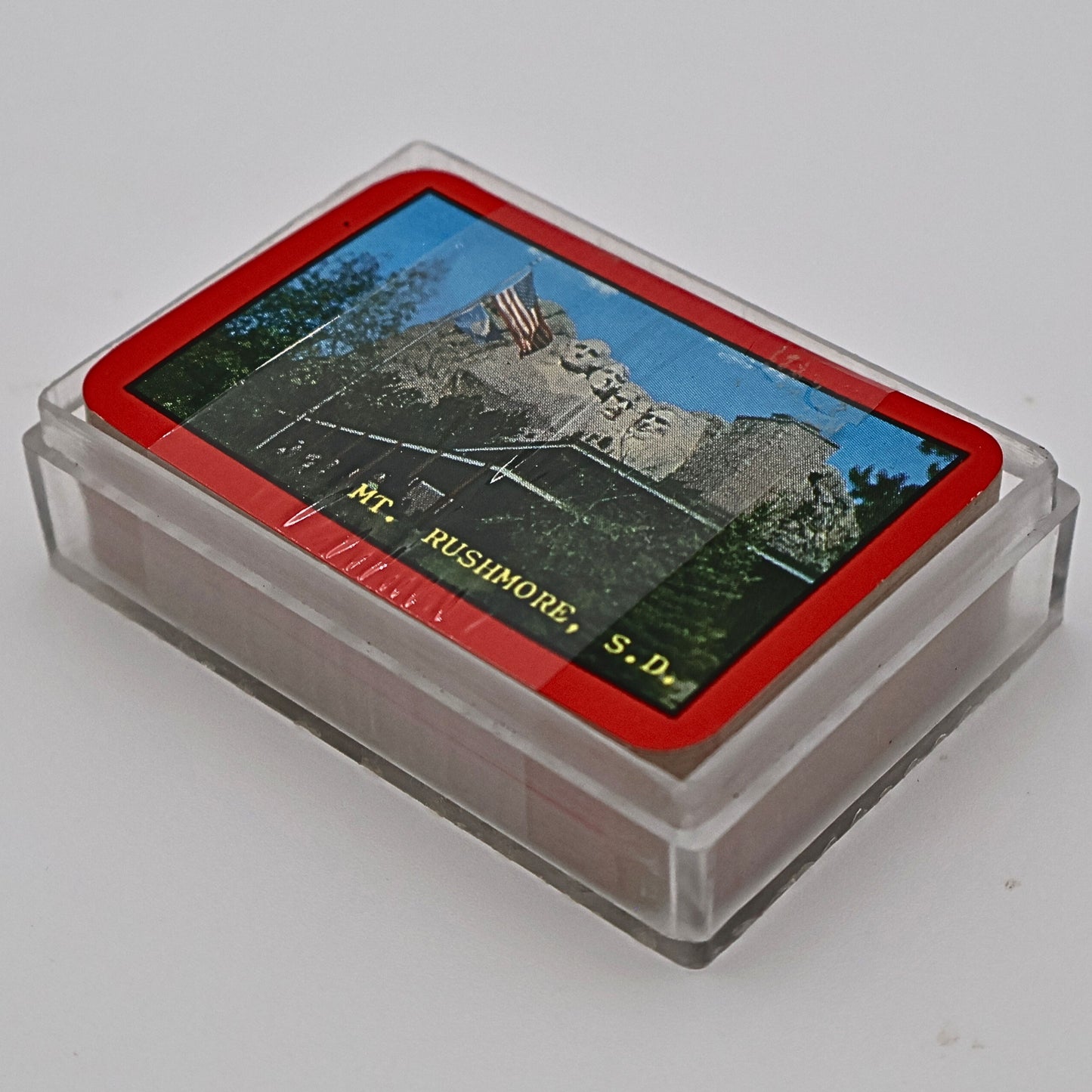 Unused Mount Rushmore playing cards sealed in original plastic sleeve and case