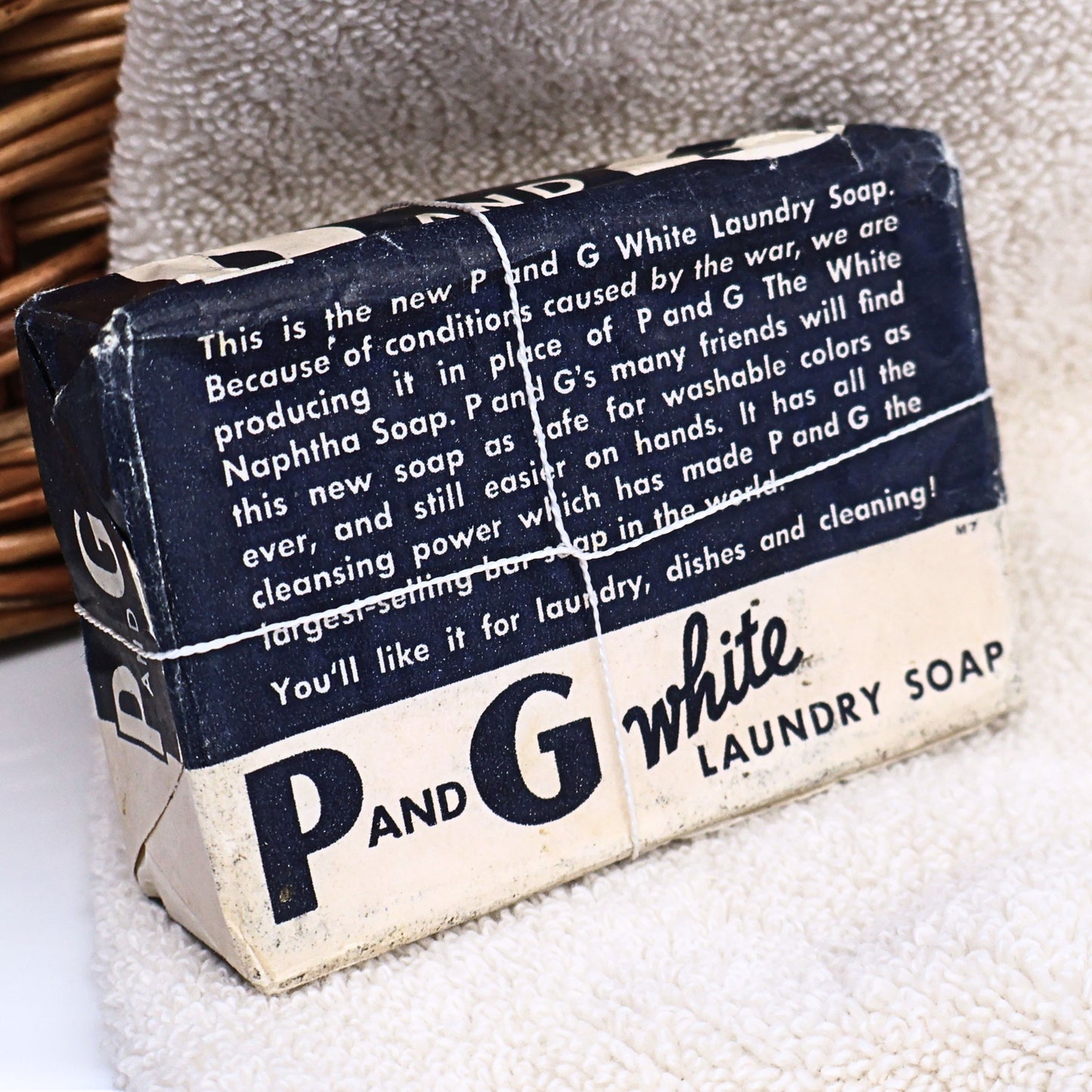 Reverse side of an authentic P&G White Laundry Soap bar featuring the original wartime wrapper text explaining the temporary replacement of White Naphtha Soap during World War II. A fascinating Procter & Gamble advertising collectible for vintage soap collectors, historians, and Americana displays.