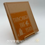 1944 Through the Year California State Series science reader hardcover textbook shown at an angle on display stand