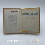 Inside front cover of 1944 Through the Year California State textbook showing discard stamp and title page