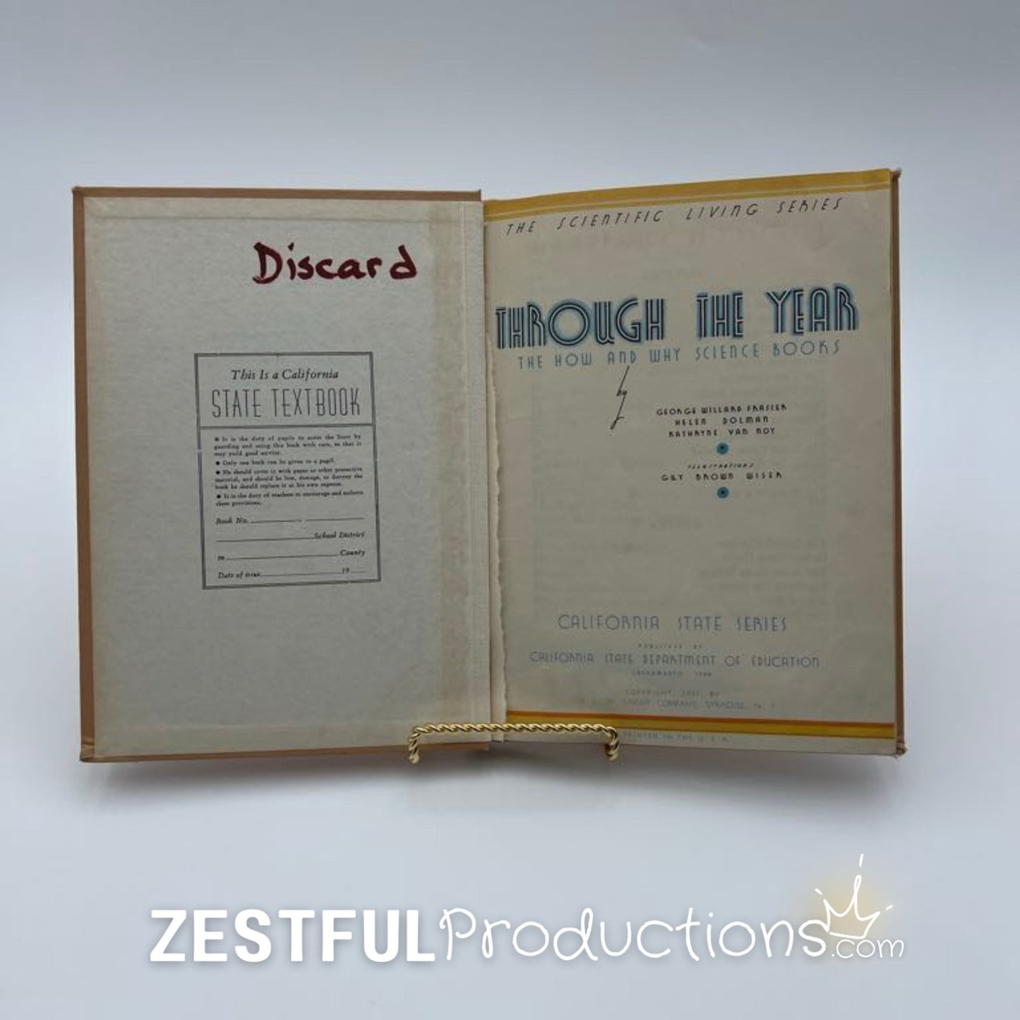 Inside front cover of 1944 Through the Year California State textbook showing discard stamp and title page