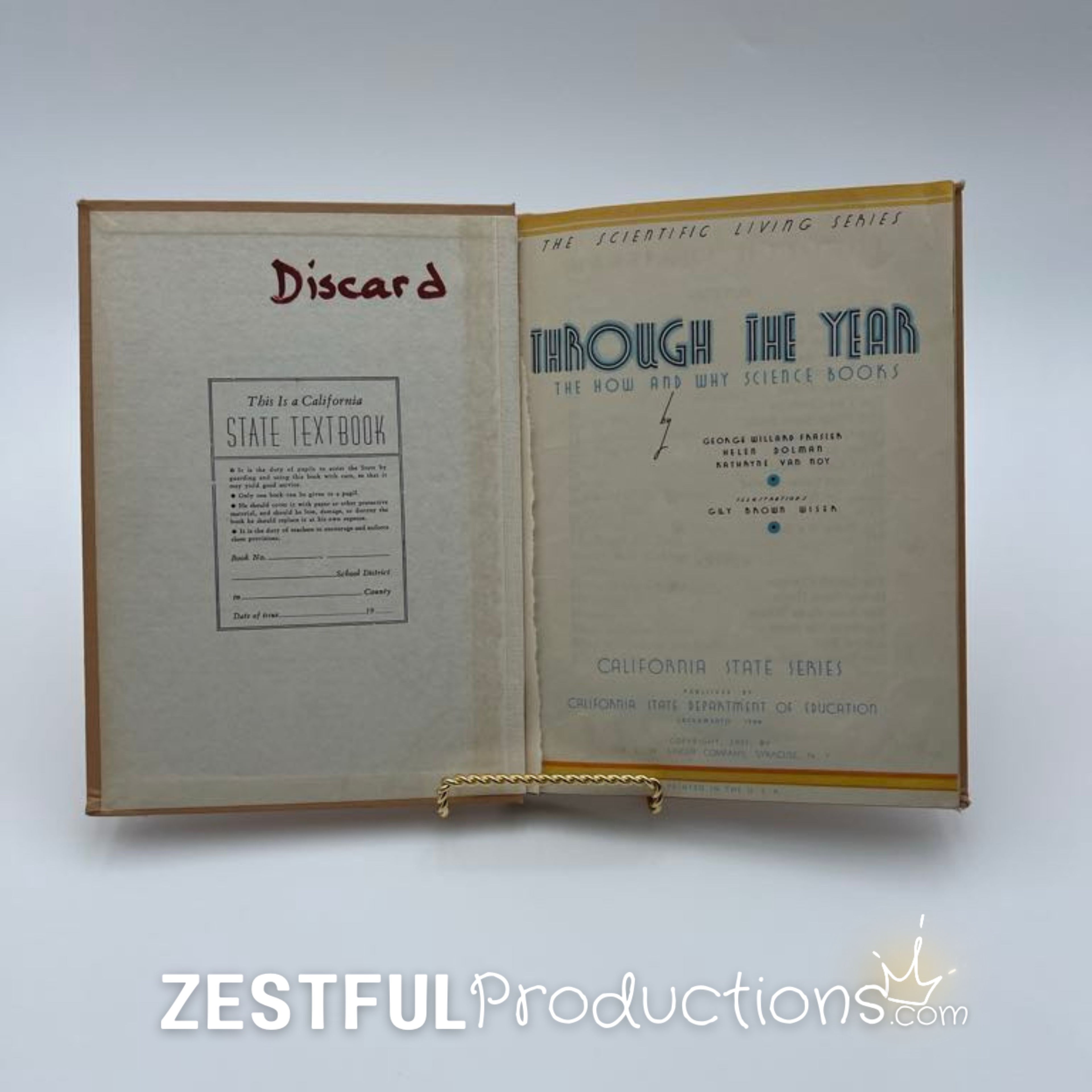 Inside front cover of 1944 Through the Year California State textbook showing discard stamp and title page