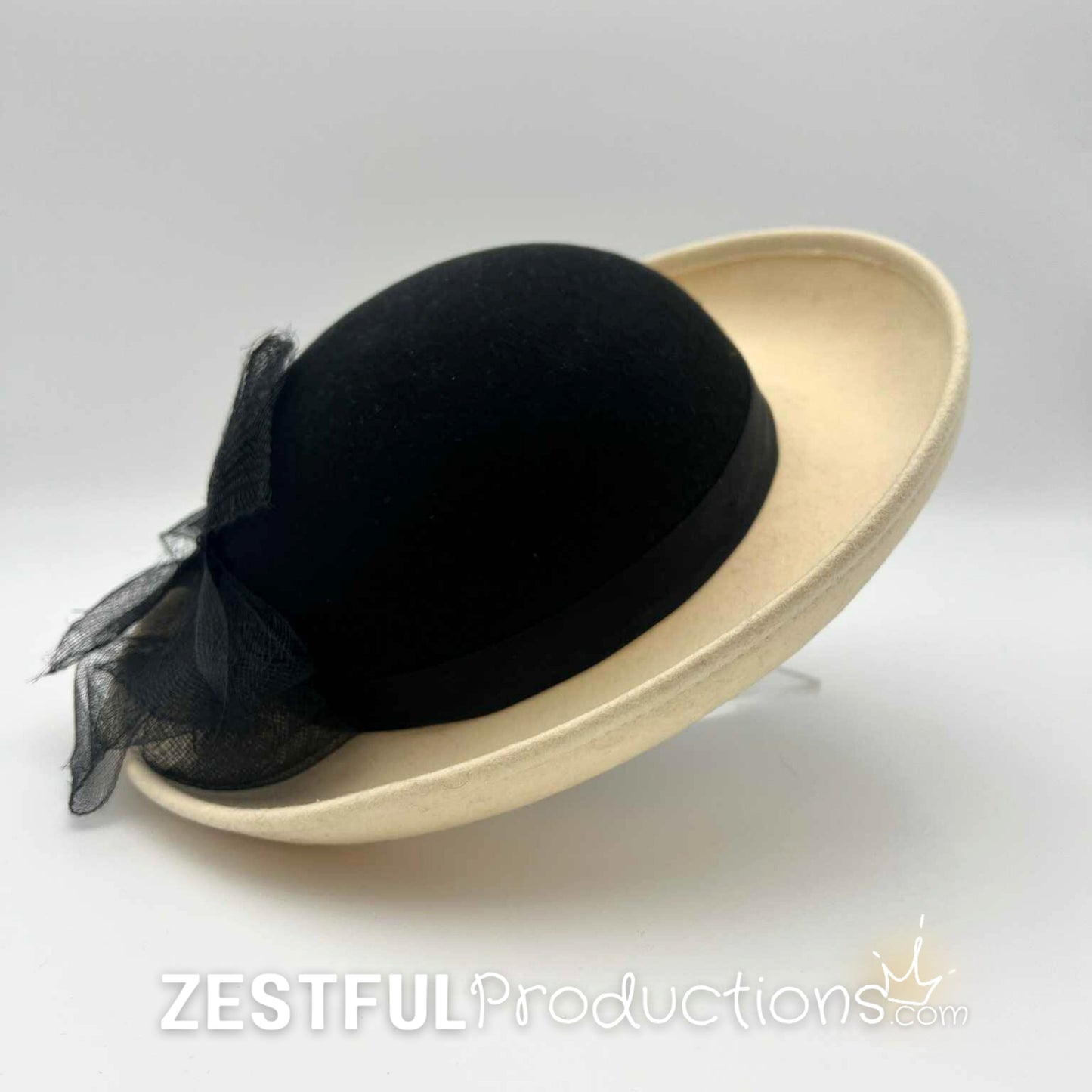 Side profile of a vintage 1950s Geo W. Bollman tilt hat with sculptural upturned brim