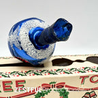 Bottom opening detail of vintage mercury glass Christmas tree topper showing blue handblown glass construction and authentic mid century holiday ornament craftsmanship from the 1960s.