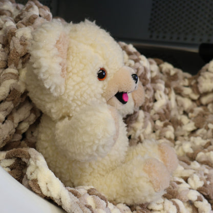 Side profile of an authentic 1986 Snuggle plush mascot highlighting its fluffy cream sherpa fabric, rounded ears, and friendly smile. A delightful vintage advertising collectible for collectors of retro toys and classic household brands.