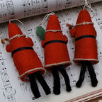 Back view of antique German Santa ornaments set showing spun cotton construction and original materials