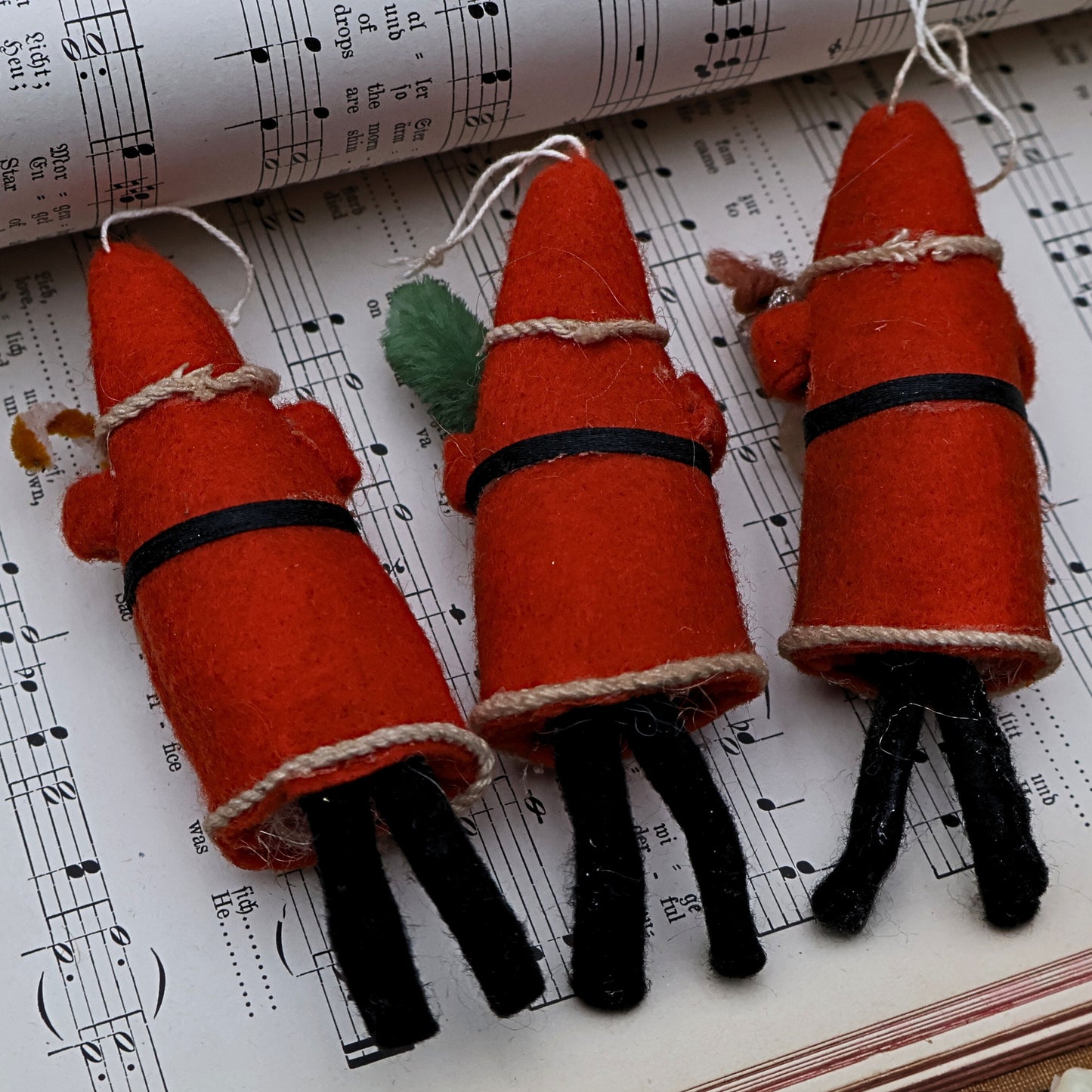 Back view of antique German Santa ornaments set showing spun cotton construction and original materials