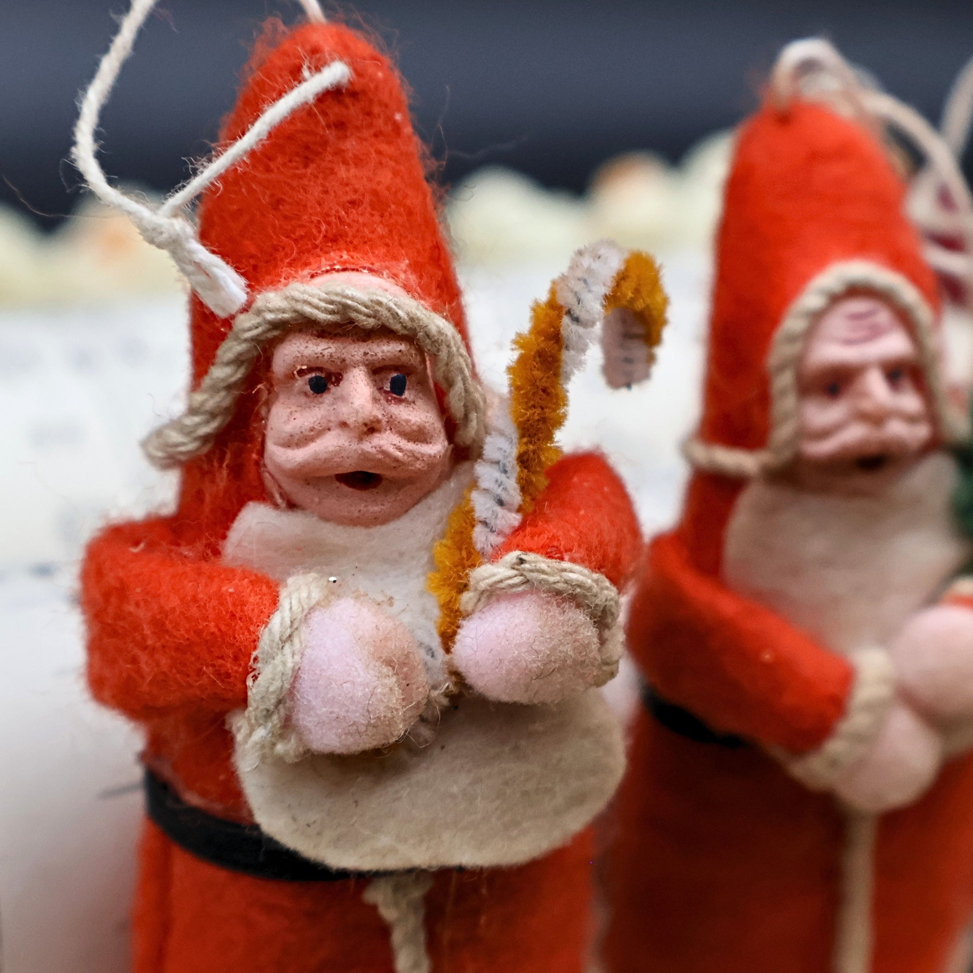 Antique German Santa ornaments handcrafted in spun cotton with unique character expressions and holiday charm