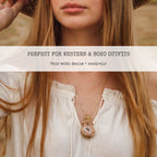 Peach druzy quartz geode necklace worn with flowy white blouse, styled for boho western outfits, gold wire wrapped crystal pendant layered with neutral tones, statement jewelry piece perfect for denim outfits and rustic fashion styling inspiration