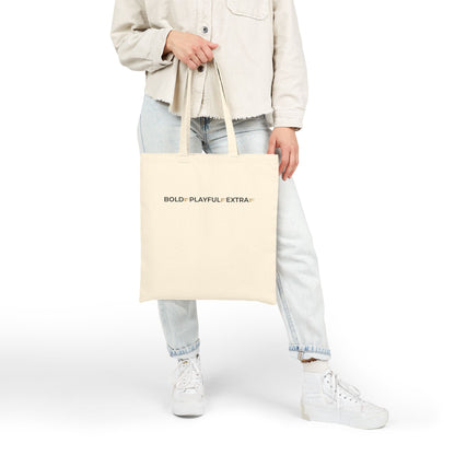 Bold Playful Extra canvas tote bag in cream carried by model for everyday style