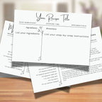 Two printable 4 x 6 inch botanical recipe cards displayed on a wooden kitchen counter. The horizontal template includes spaces for a recipe title, ingredients, directions, preparation time, cooking time and serving information.