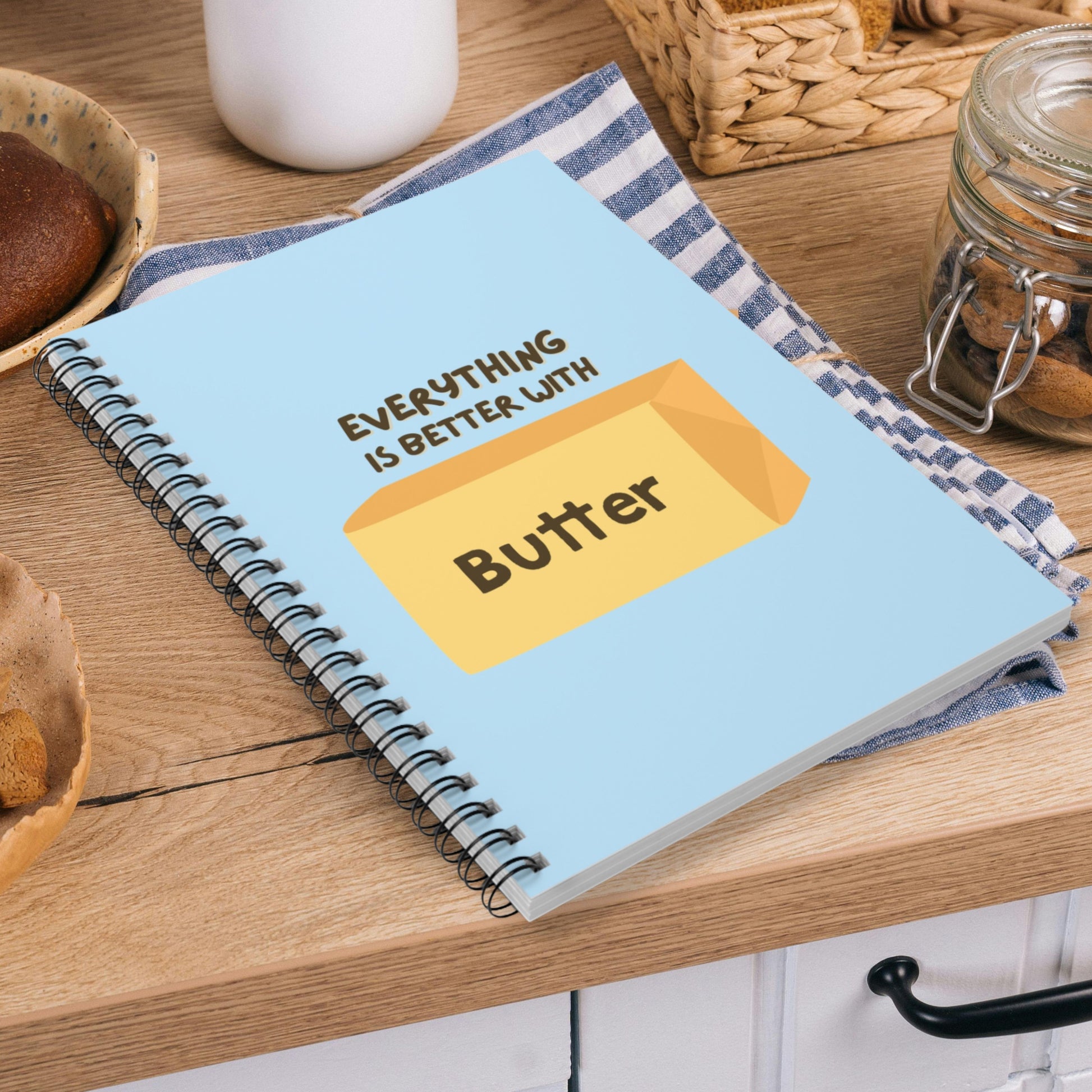 Butter notebook shown in flat lay with clean styling and spiral binding. Practical journal for note taking, planning, and everyday use.