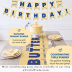 Matching butter birthday party decor featuring coordinating pennant banner and butter table runner with retro foodie aesthetic. Boutique toddler birthday accessories styled for cake smash photos and playful party themes.