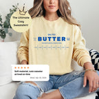 Customer review image of personalized butter sweatshirt highlighting comfort and fit. Cozy crewneck perfect for gifting.