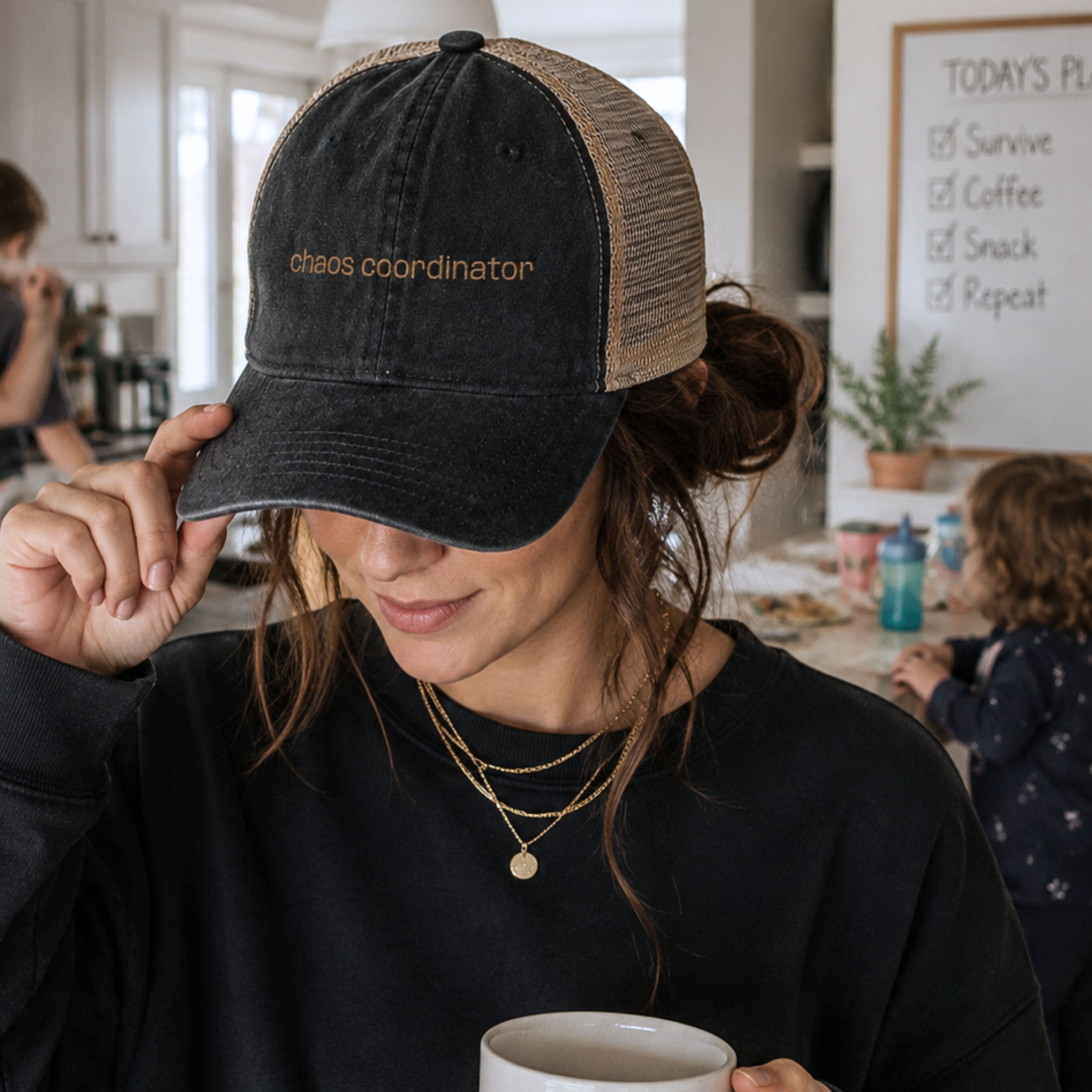 Woman wearing chaos coordinator embroidered trucker hat in a busy everyday lifestyle setting