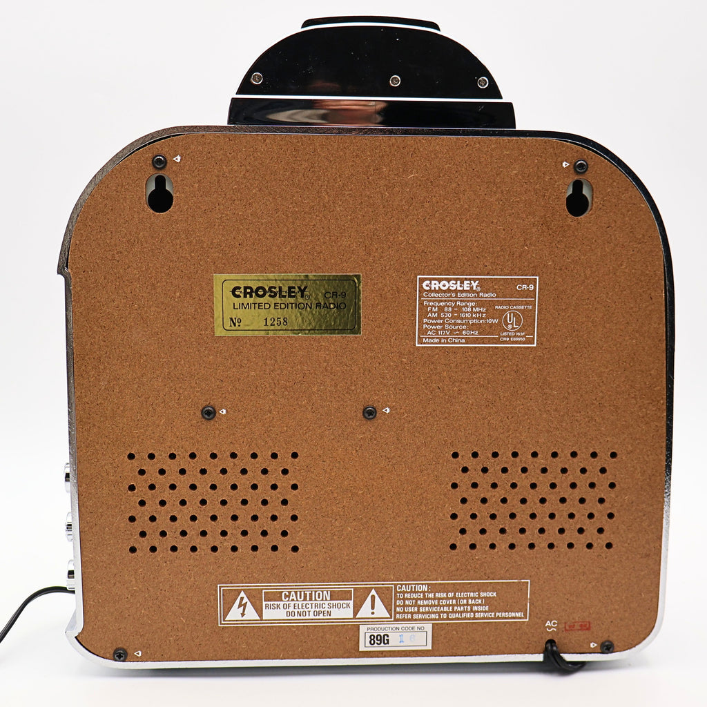 Back view of Crosley CR-9 jukebox radio with limited edition label, model information and speaker vents, collectible retro audio device with vintage inspired construction details