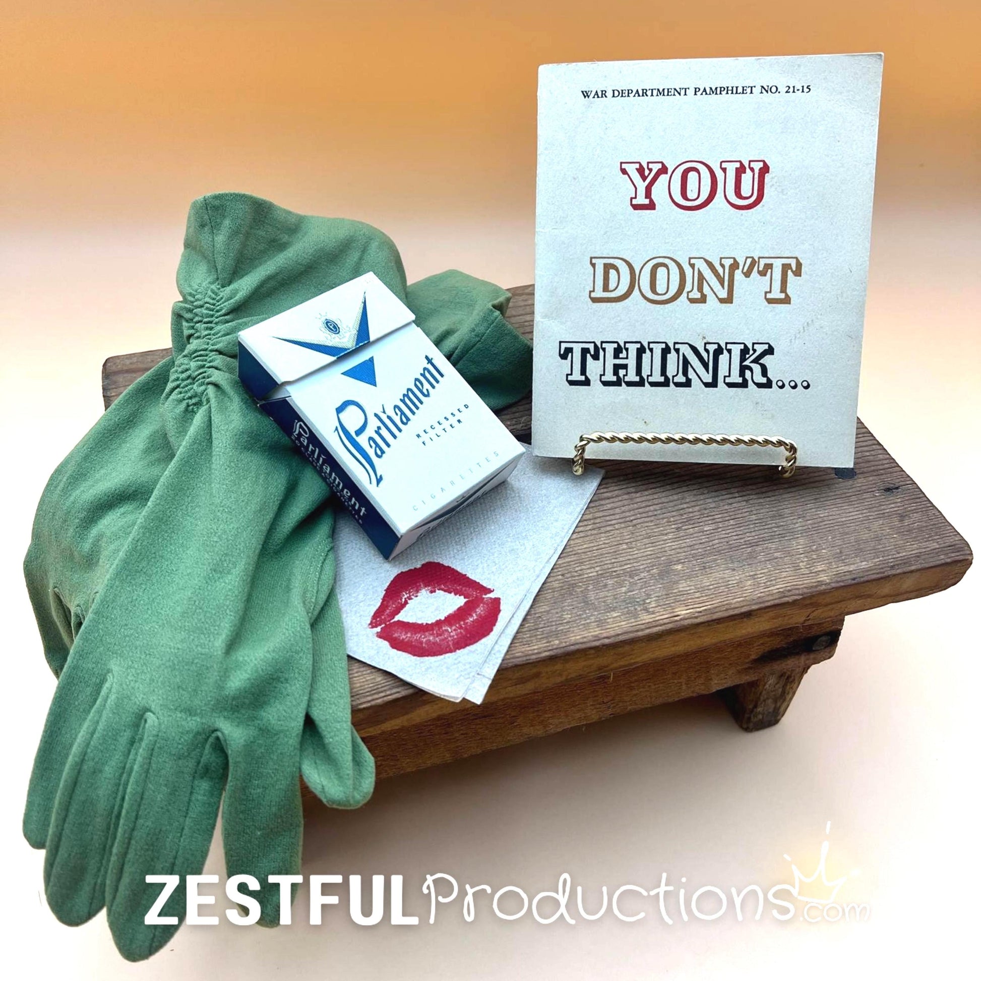 Curated WWII military vignette with 1944 War Department ephemera