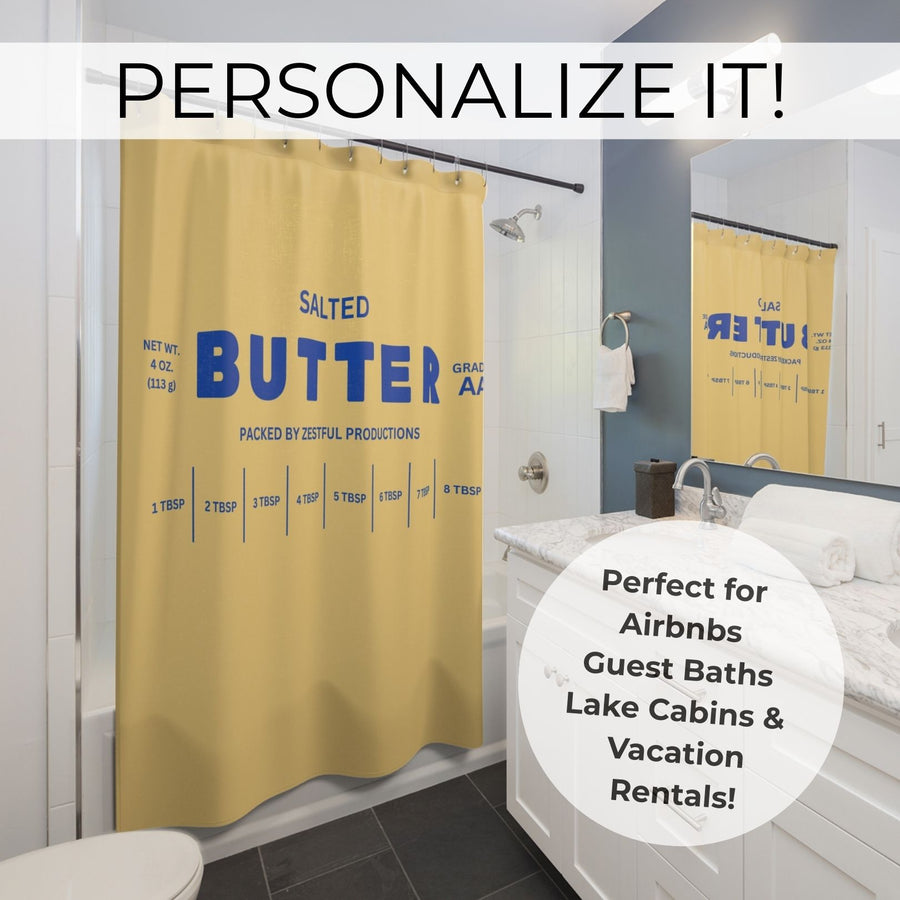Custom butter shower curtain with personalized text option shown in bathroom setting. Butter label style design allows name or phrase customization. Great gift idea for housewarming, Airbnb hosts, or anyone who loves quirky and funny decor.