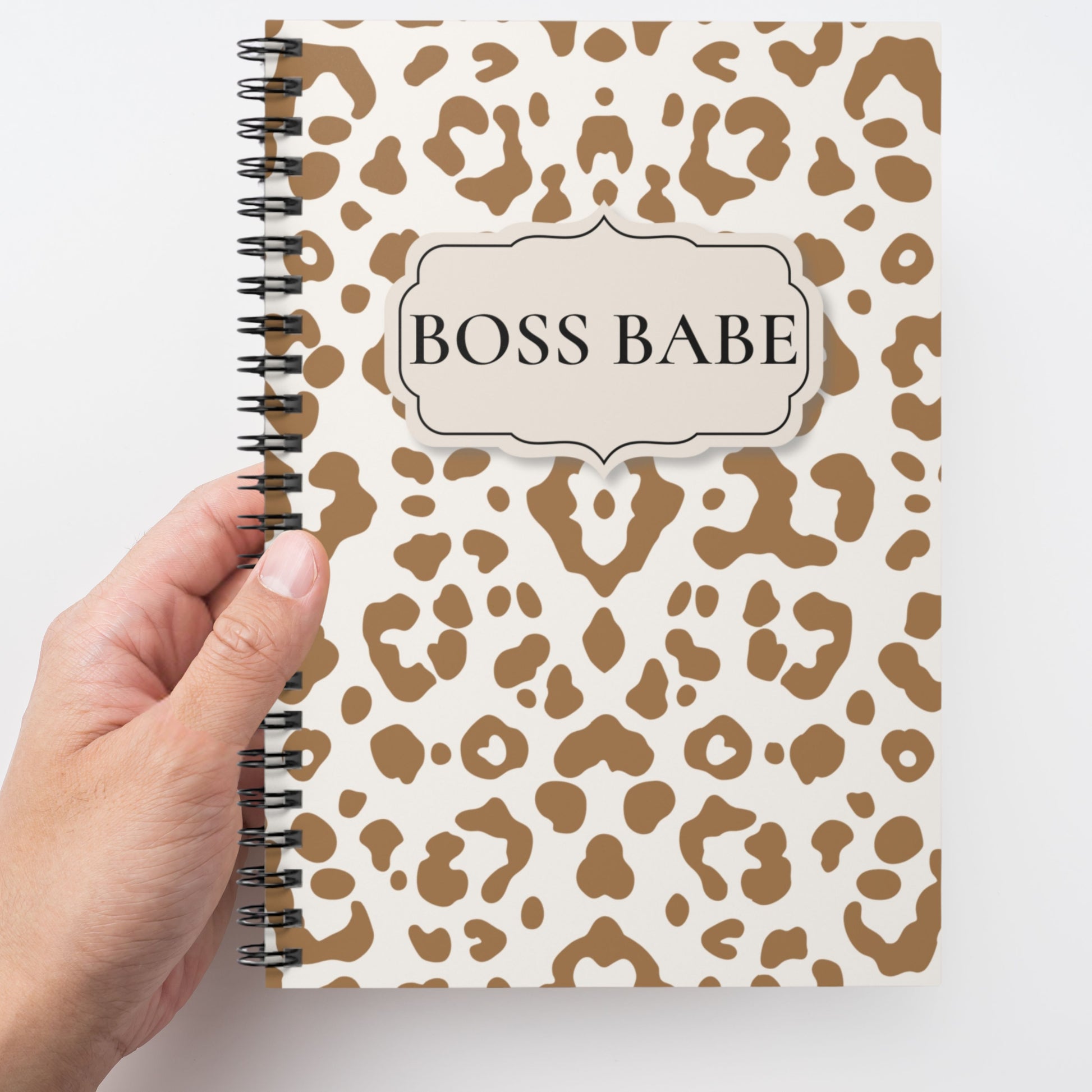 Custom name leopard spiral notebook in hand showing sizing