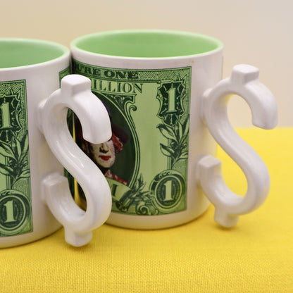 Detail of sculpted dollar sign mug handle from 1986 Enesco coffee cup