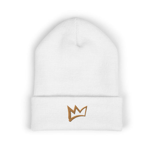 White cuffed beanie with a small embroidered crown logo, minimalist knit hat