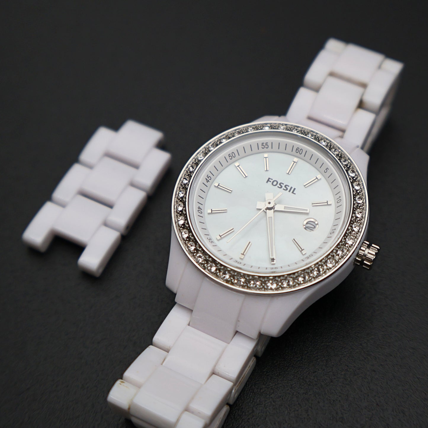 Fossil ES2437 Stella Mini watch white resin bracelet with removable links and crystal bezel close view
