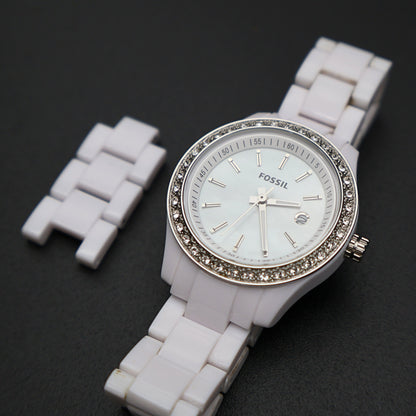 Fossil ES2437 Stella Mini watch white resin bracelet with removable links and crystal bezel close view