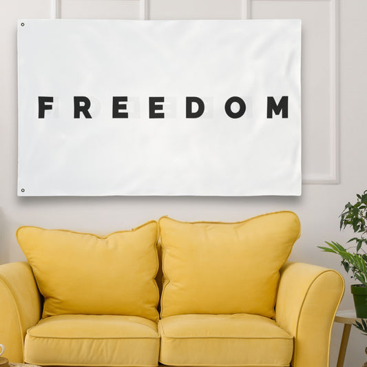 Minimalist black and white Freedom flag banner displayed indoors