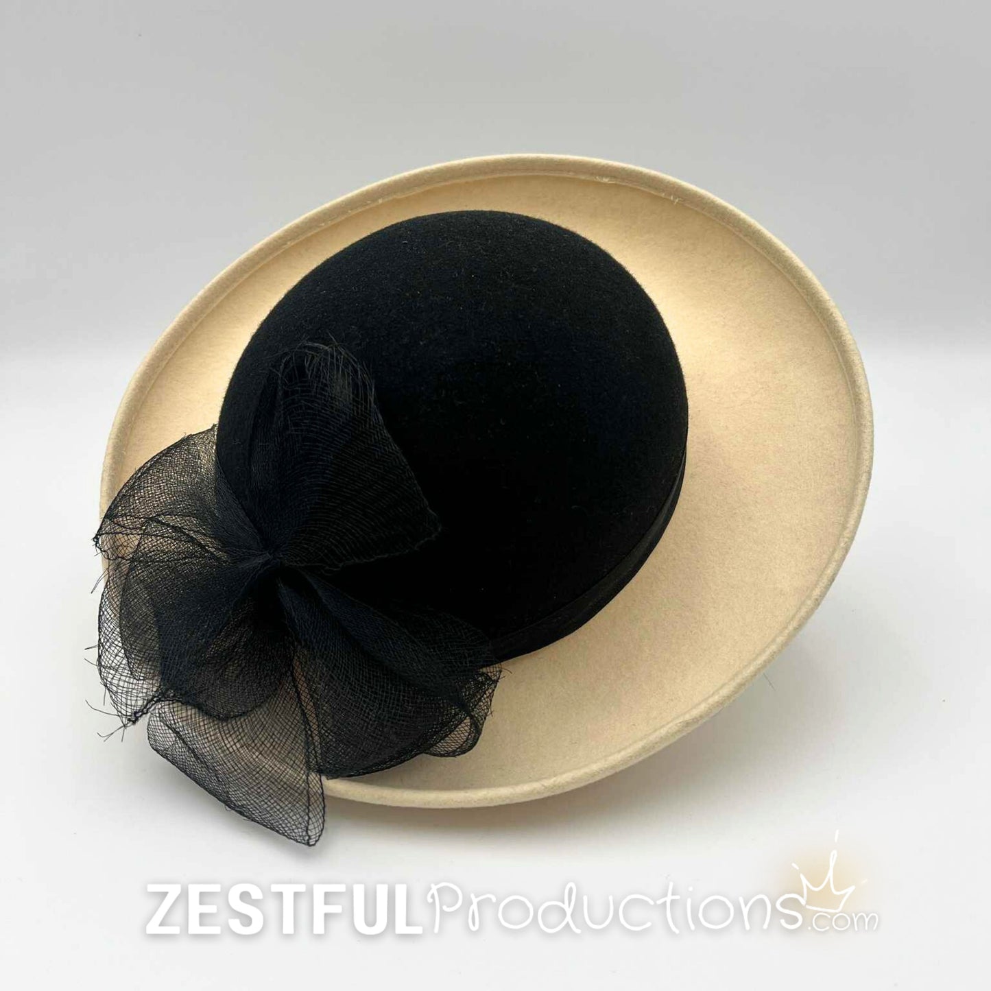 Top view of a vintage Geo W. Bollman 1950s tilt hat featuring a dramatic black net bow