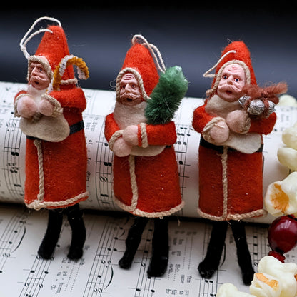 German Belsnickle Santa ornaments set of 3 showcasing vintage folk art Christmas craftsmanship and detail
