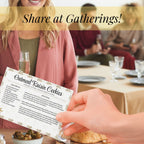 Guest holding a Golden Wheat inspired recipe card while family and friends gather around a dining table. The printable card offers a charming way to exchange favorite dishes, share food traditions and preserve meaningful family recipes.