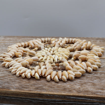 Boho beach house decor trivet crafted from natural cream seashells