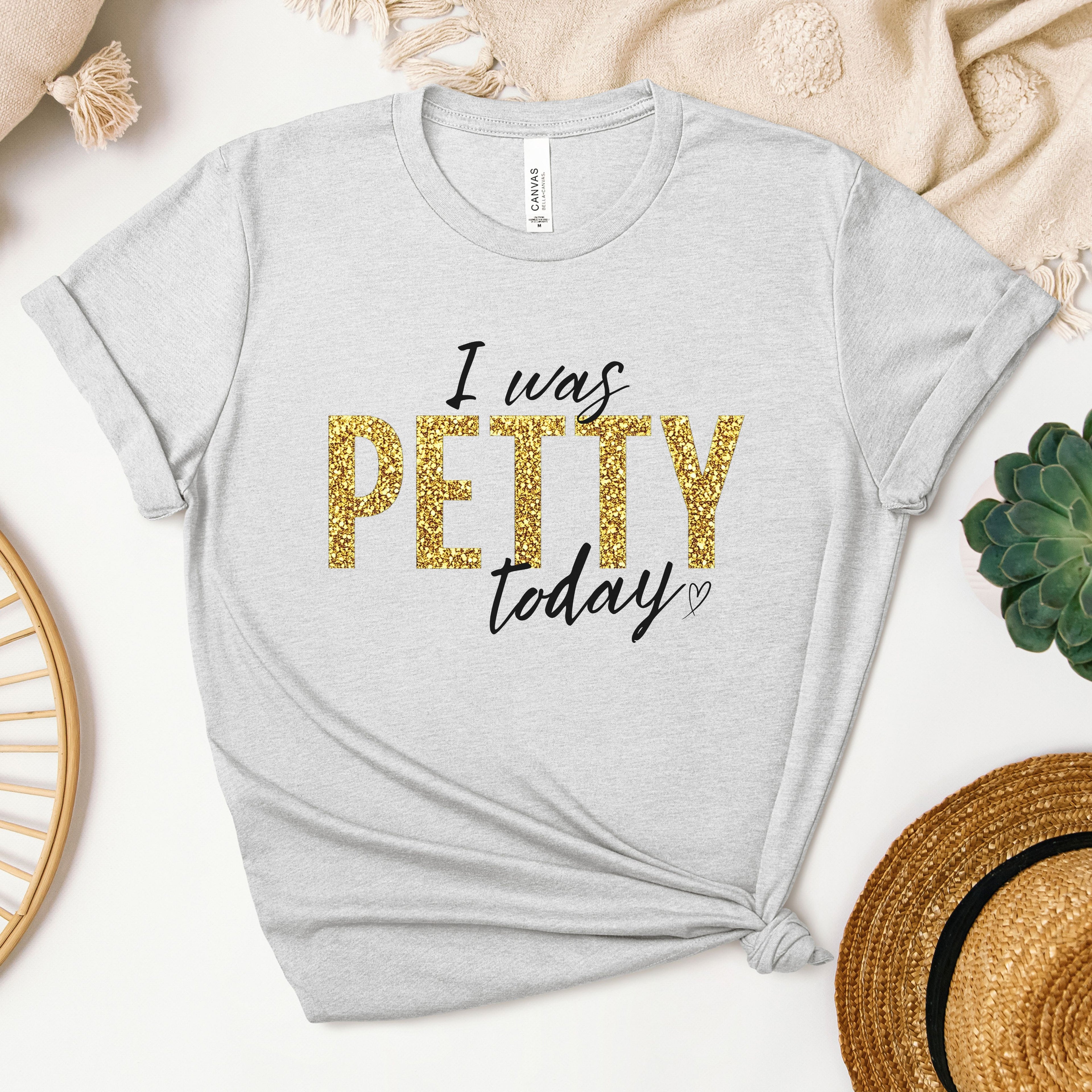 Athletic heather gray t-shirt with gold faux glitter “I Was Petty Today” design, neutral flat lay mockup, funny statement tee for women, soft Bella Canvas style shirt