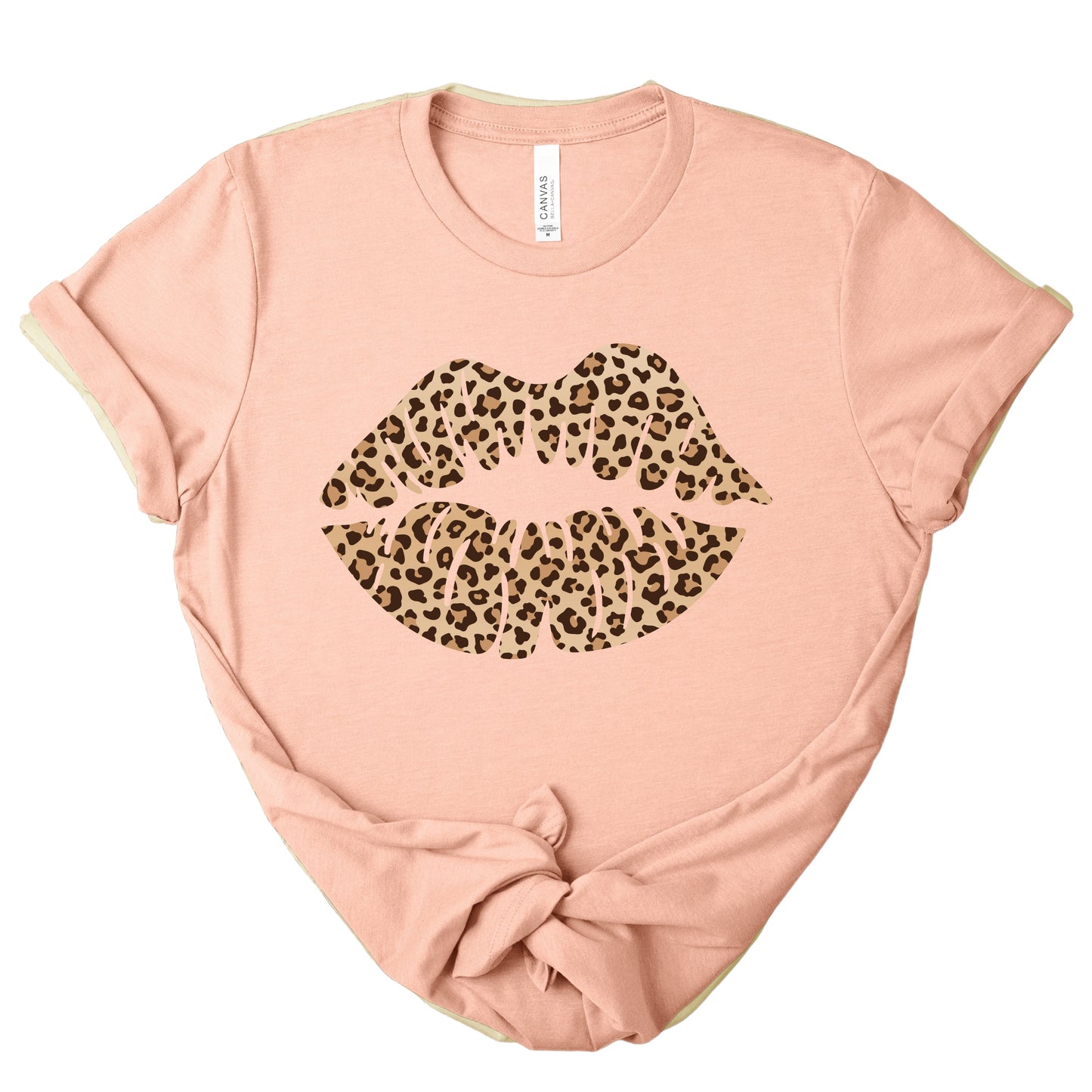 Blush pink leopard kiss tee with leopard print lips graphic on soft women’s t-shirt