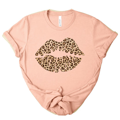 Blush pink leopard kiss tee with leopard print lips graphic on soft women’s t-shirt