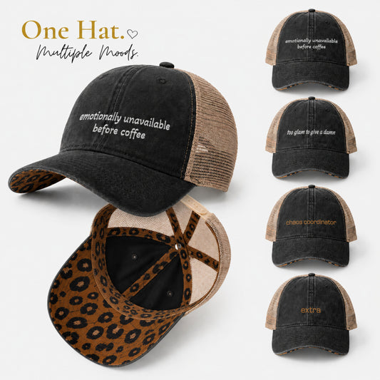 Washed black women’s ponytail trucker hat with leopard underbrim shown in multiple embroidered phrase options including emotionally unavailable before coffee and chaos coordinator