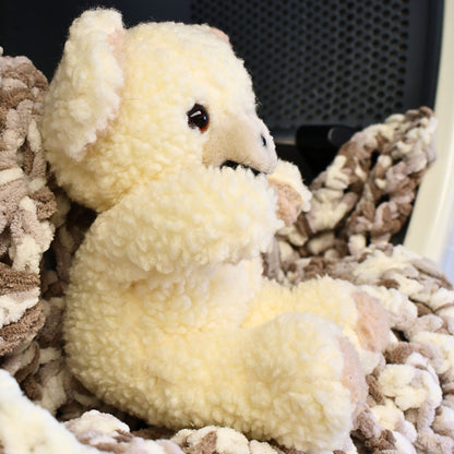 Side profile of a vintage Lever Brothers Snuggle mascot featuring soft cream-colored plush, rounded ears, and original construction details. Ideal for collectors of nostalgic advertising characters, laundry room decor, vintage toys, and classic 1990s memorabilia.