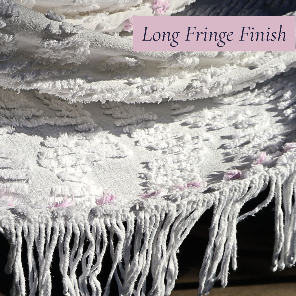Original long decorative fringe on a vintage white chenille bedspread adds beautiful movement and timeless character. This heirloom textile is ideal for cottage bedroom decor, farmhouse bedding, shabby chic interiors, and vintage home styling.