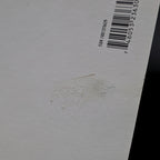 Detail of minor texture imperfection on back of Marilyn Monroe 1959 Jump postcard