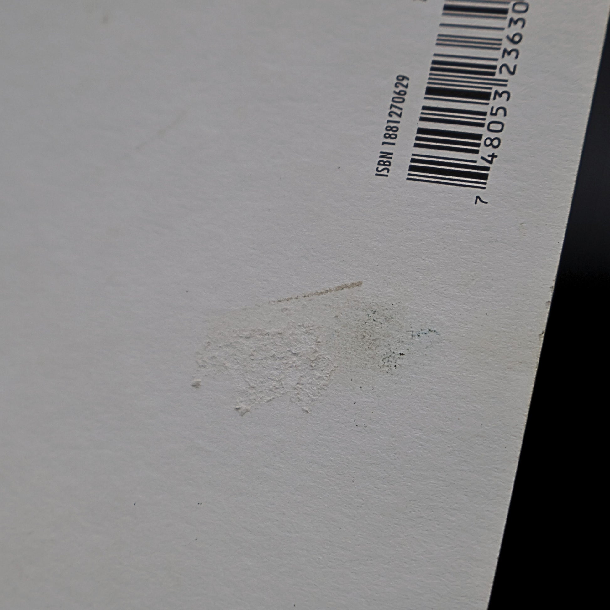 Detail of minor texture imperfection on back of Marilyn Monroe 1959 Jump postcard