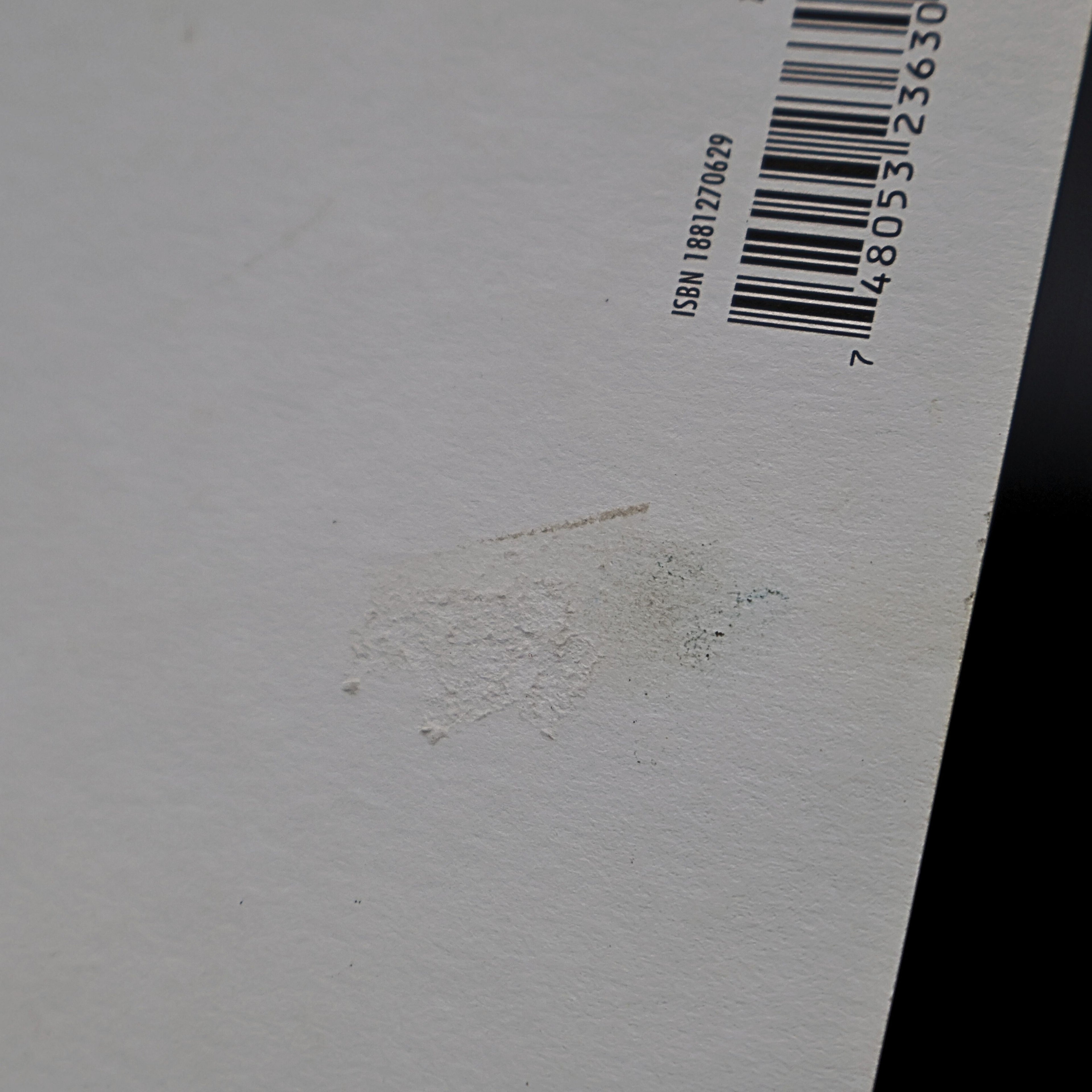 Detail of minor texture imperfection on back of Marilyn Monroe 1959 Jump postcard