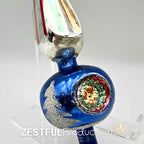 Detailed close-up of vintage blue mercury glass Christmas tree topper with indented reflector center and silver accents, showcasing retro mid century holiday ornament artistry.