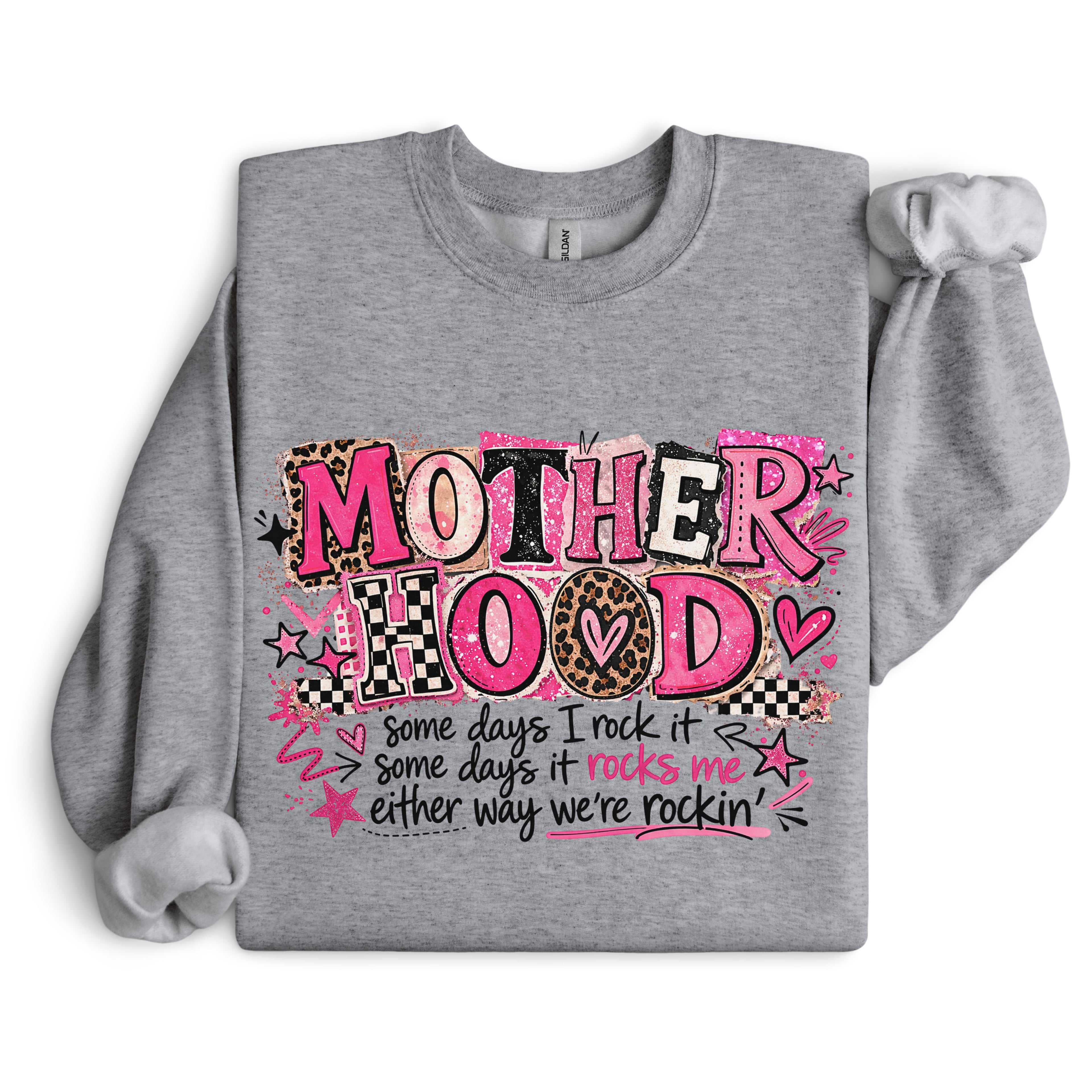 Heather grey Mother Hood graphic crewneck sweatshirt featuring trendy pink lettering and playful motherhood quote in flat lay image.