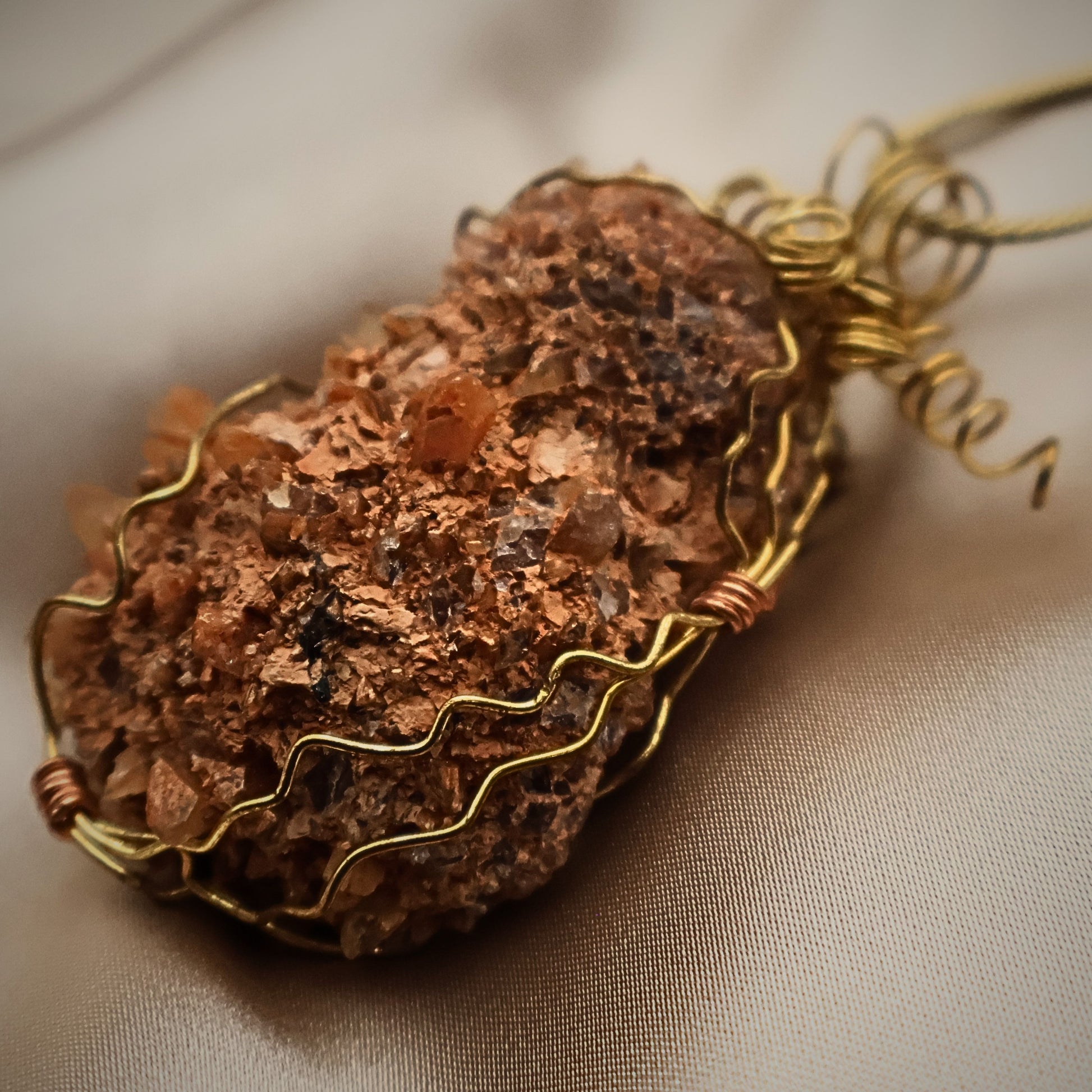 Back view of peach druzy quartz geode necklace showing raw natural stone texture and gold wire wrapped design, crystal specimen pendant with organic rugged surface, handmade boho western jewelry piece with earthy mineral detail