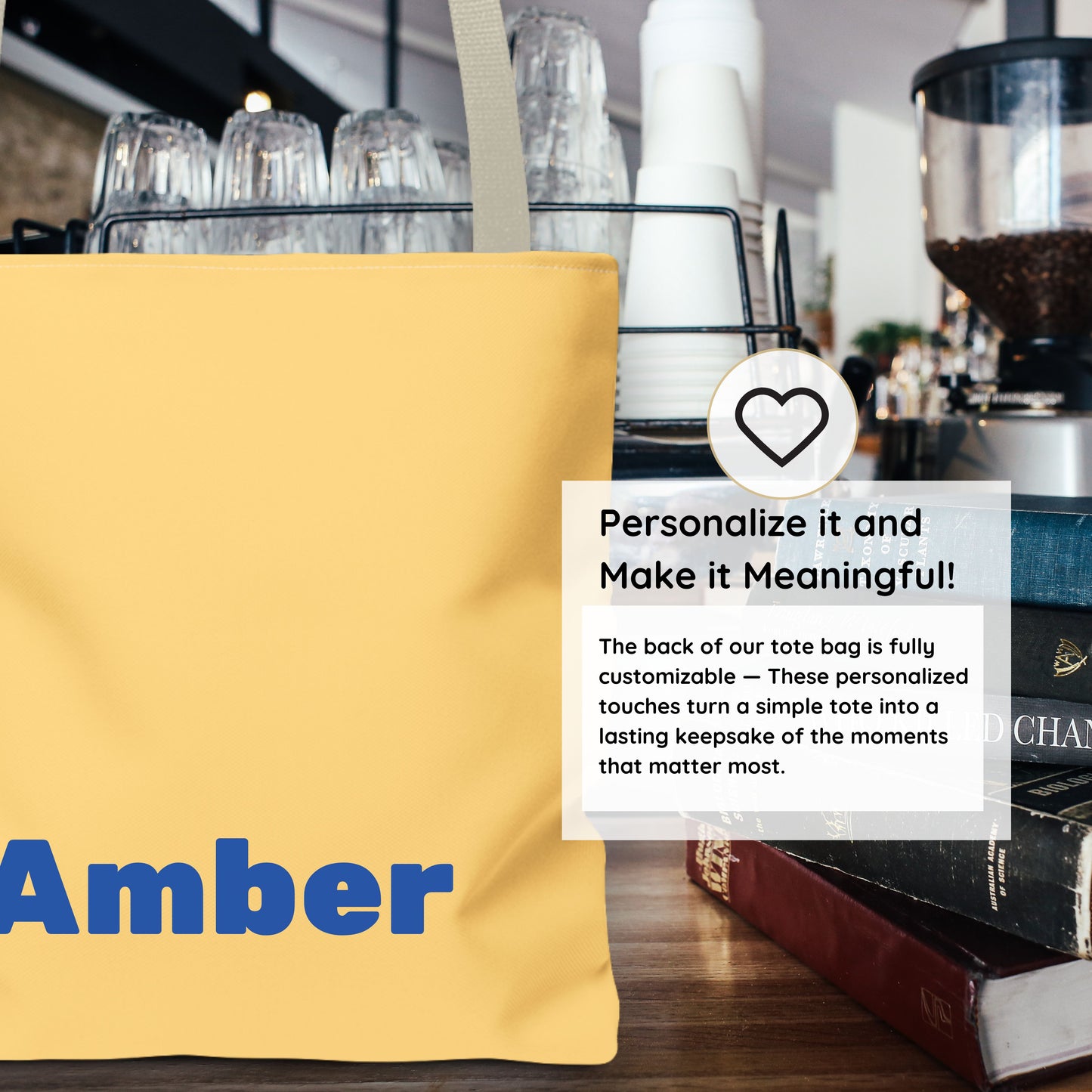 Back side of personalized butter tote bag showing custom name example in bold blue lettering. Yellow reusable tote bag with playful butter design for everyday use and gifting.
