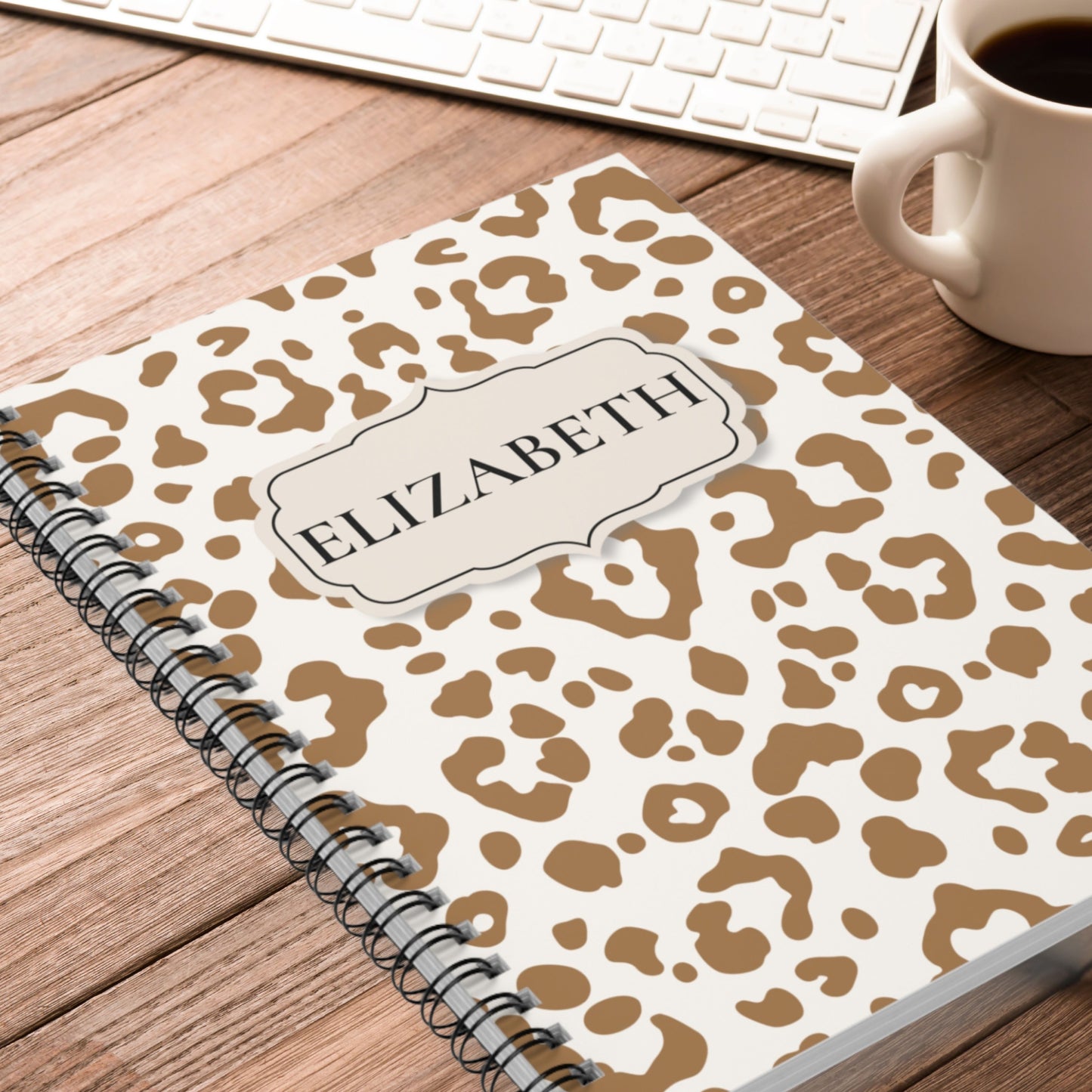 Leopard luxe personalized notebook styled on desk for journaling and planning