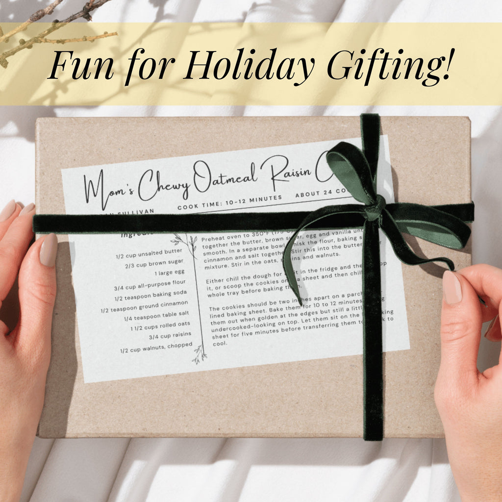 Printed botanical recipe card tied with a black ribbon and presented as a holiday gift. The image shows how a personalized family recipe can become a thoughtful Christmas keepsake, recipe exchange present or addition to a kitchen gift basket.